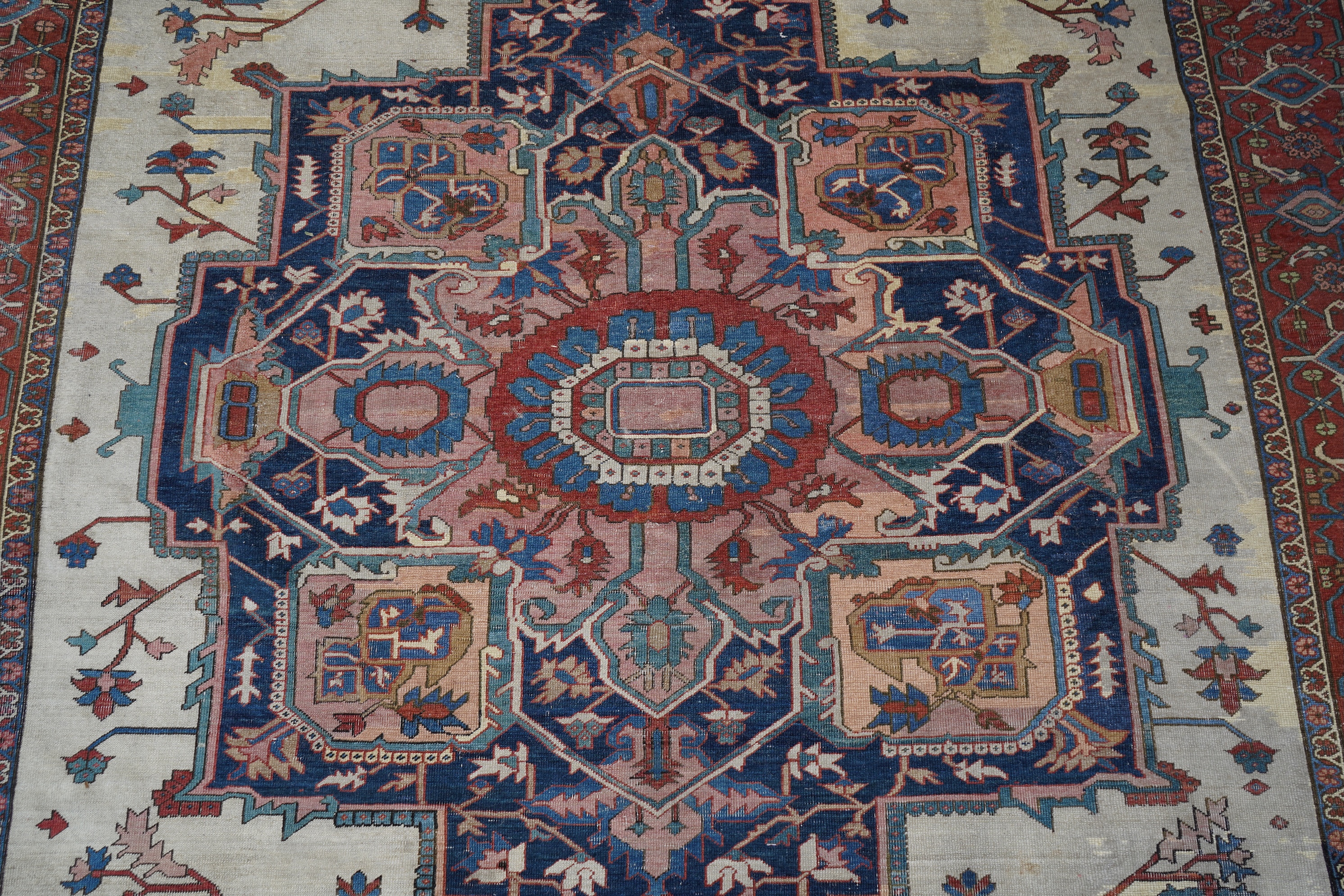 An early 20th century Heriz ivory ground carpet